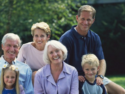 Smiling Family Posing on Bench